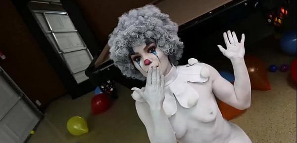  Sexy babe wears clown makeup and teases